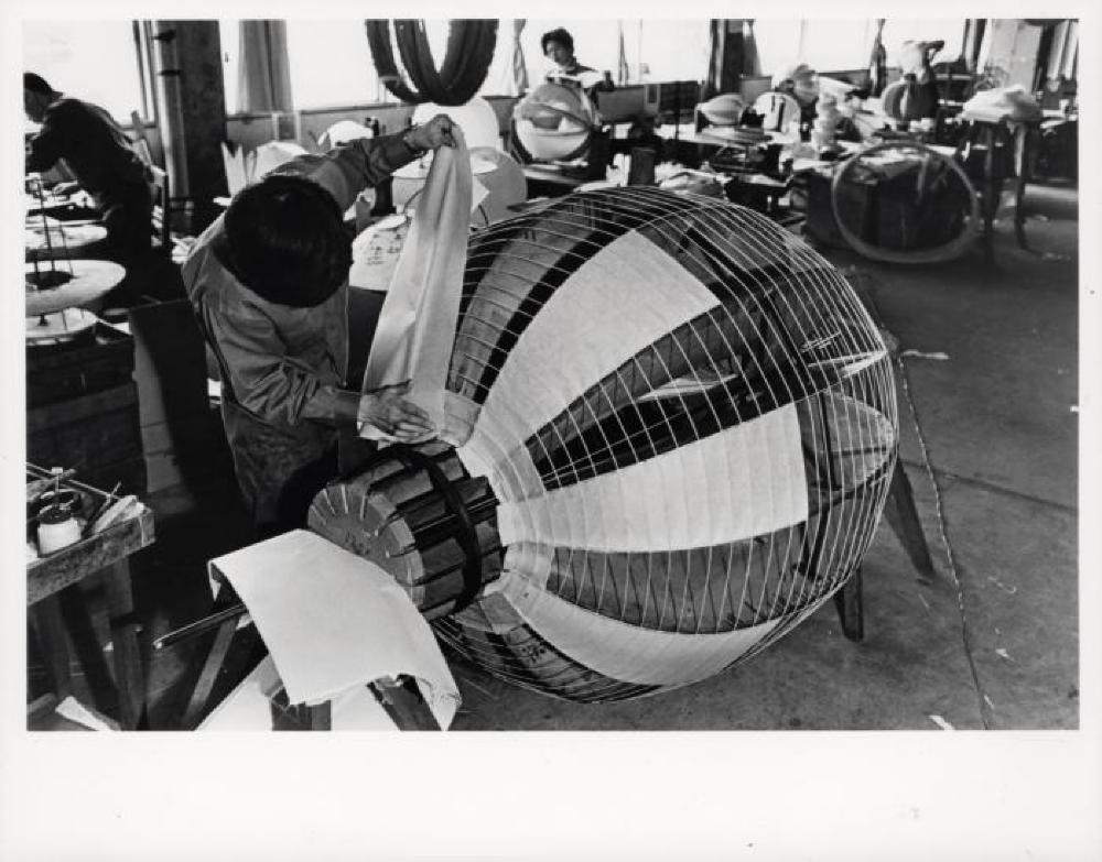 Worker at Ozeki Factory constructing Akari