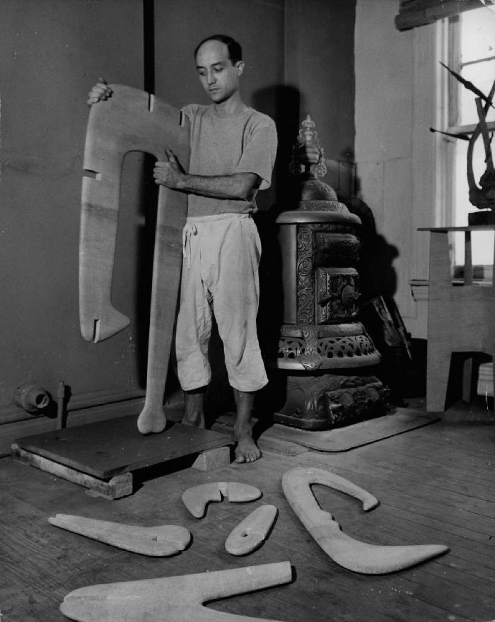 Isamu Noguchi assembling "Figure" in his MacDougal Alley studio