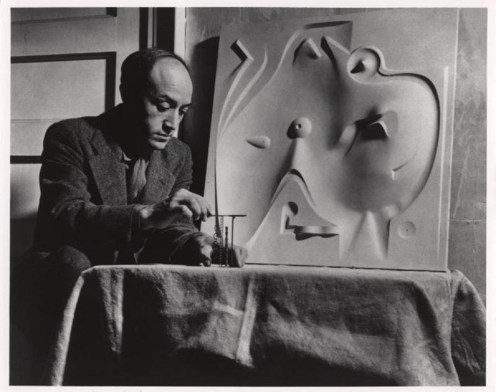 Isamu Noguchi with model for Contoured Playground