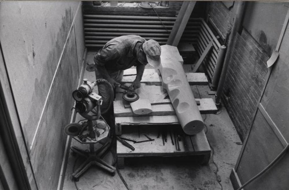 Isamu Noguchi working on Composition for Arrivals Building at Idlewild Airport at Edison Price Workshop