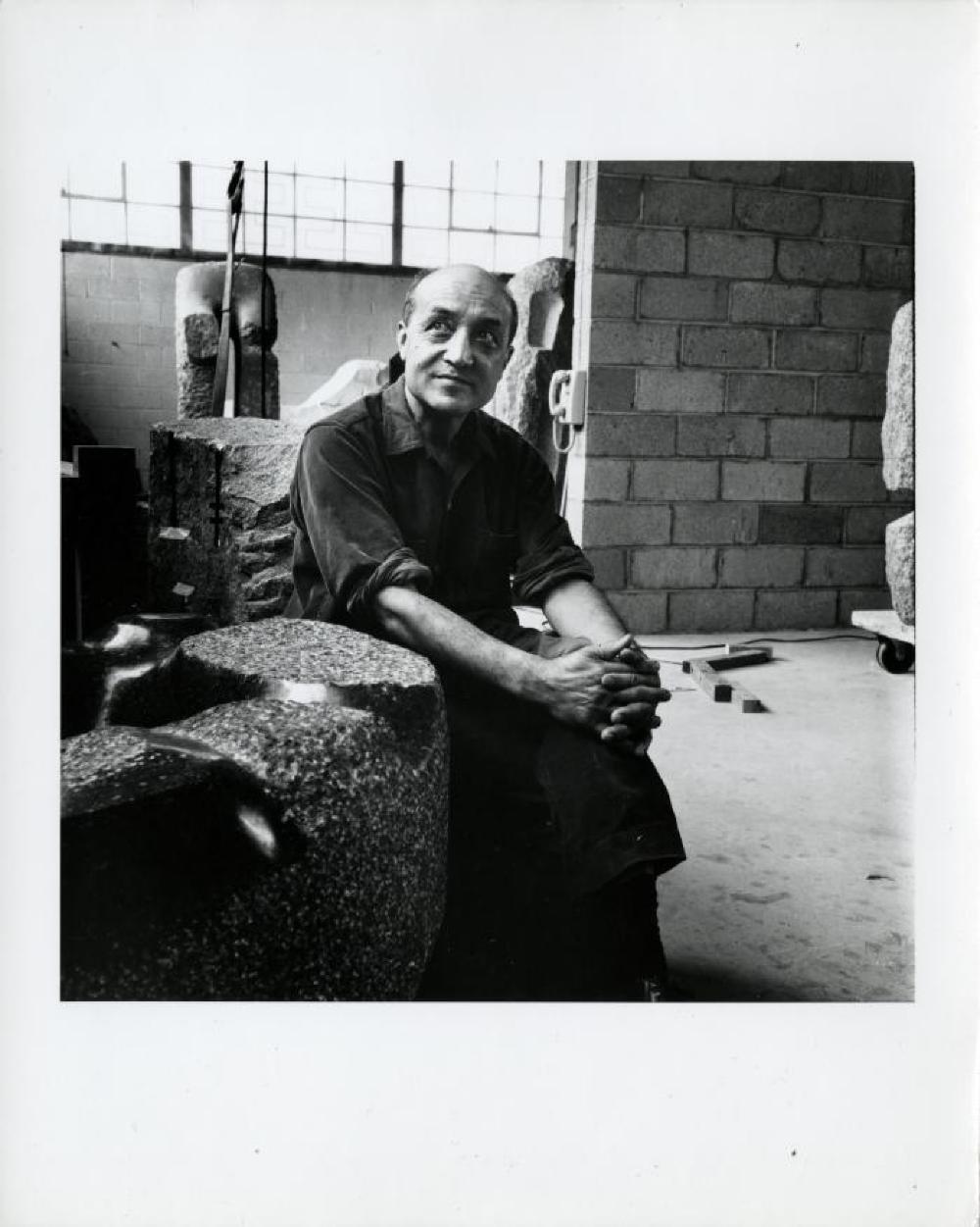 Isamu Noguchi in Long Island City studio with works