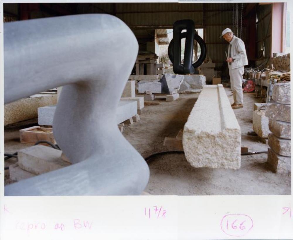 Isamu Noguchi working in Mure studio