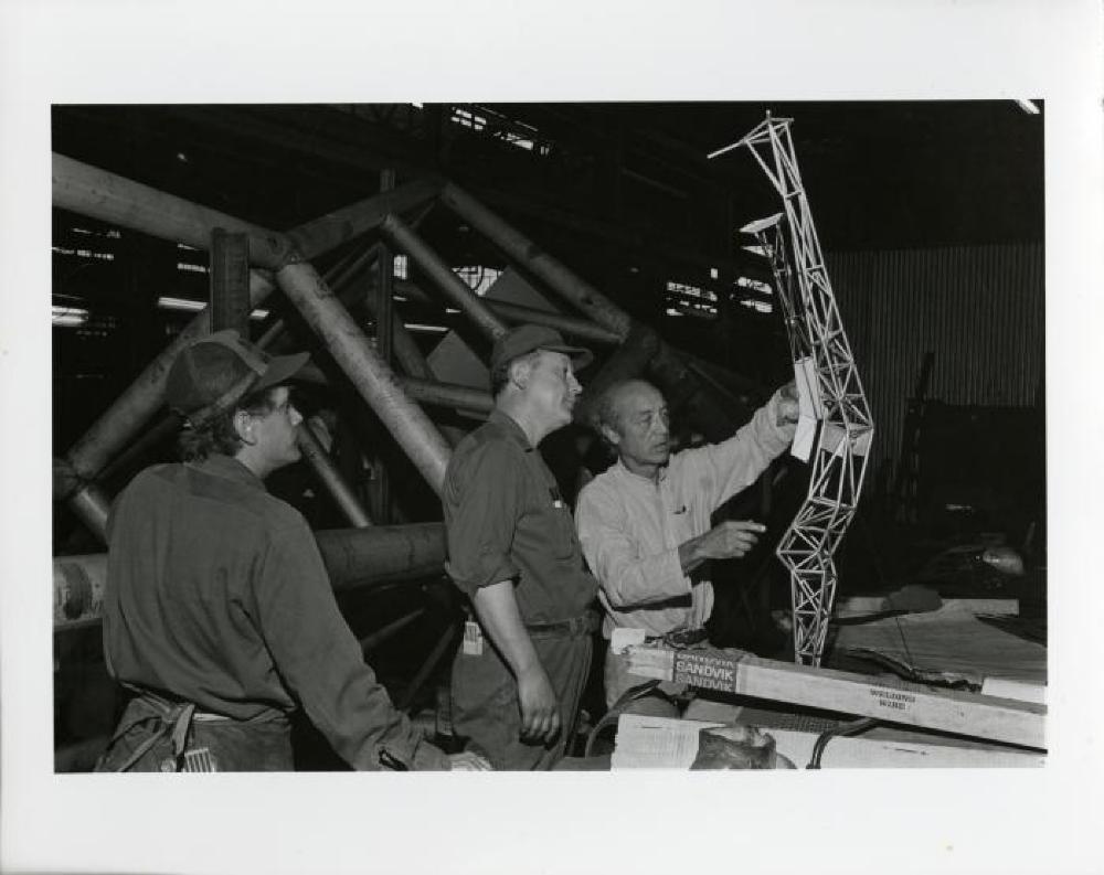 Isamu Noguchi at construction of Bolt of Lightening/Memorial to Ben Franklin