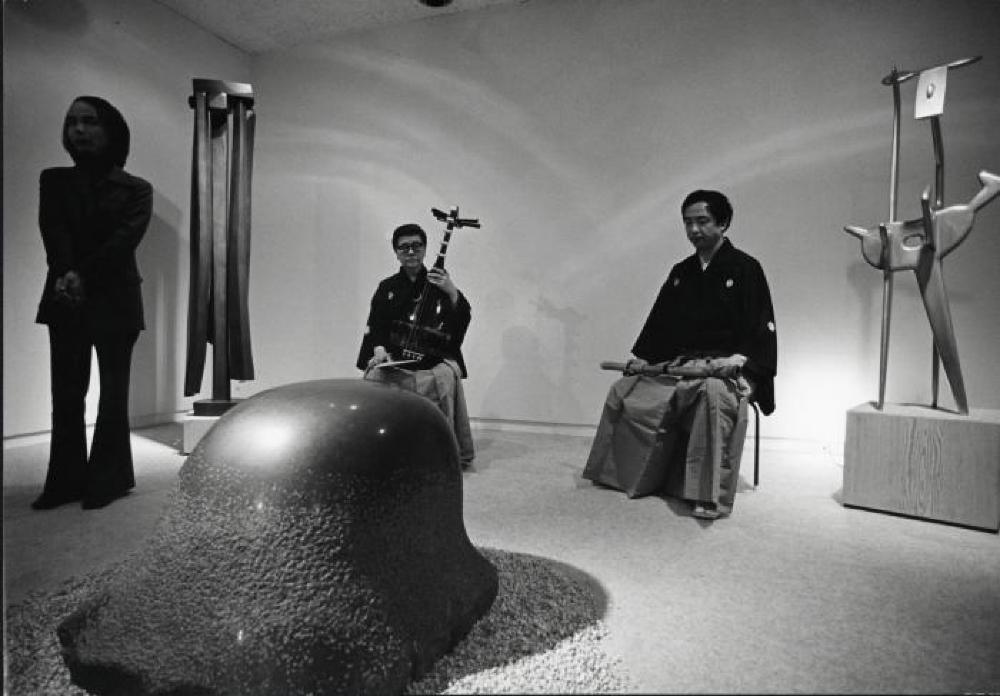 Installation view of "Isamu Noguchi," Minami Gallery, May 14, 1973 - June 9, 1973. Toru Takemitsu standing at left