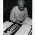 Noguchi signing catalogues at opening reception for Noguchis Imaginary Landscapes, Detroit Institute of Fine Arts, April 10 – June 10 1979 (travel from Walker Art Center).