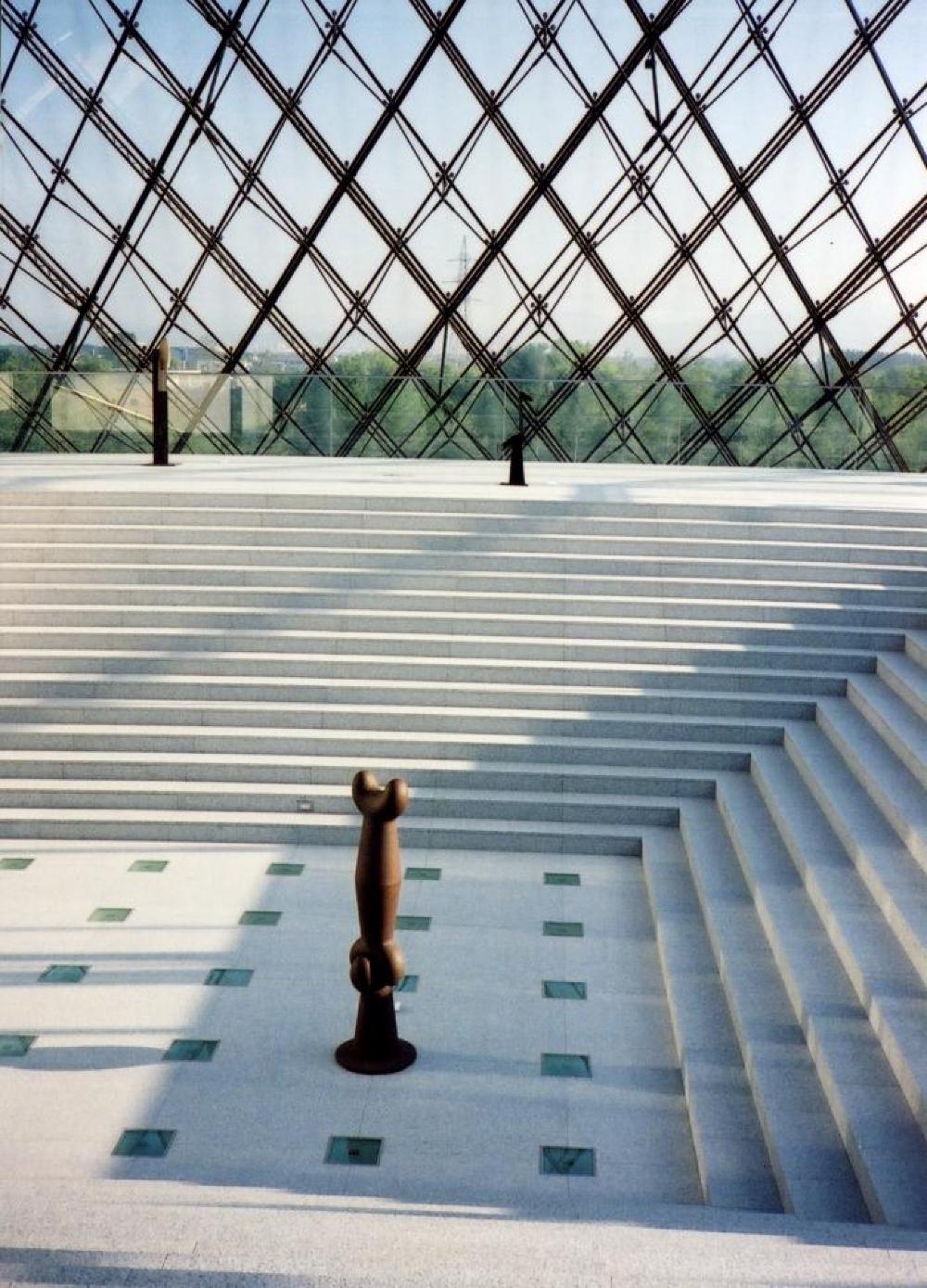Installation view of "Isamu Noguchi Exhibition in the Glass Pyramid," Moerenuma Park, Glass Pyramid Atrium, July 22, 2003 - August 31, 2003.