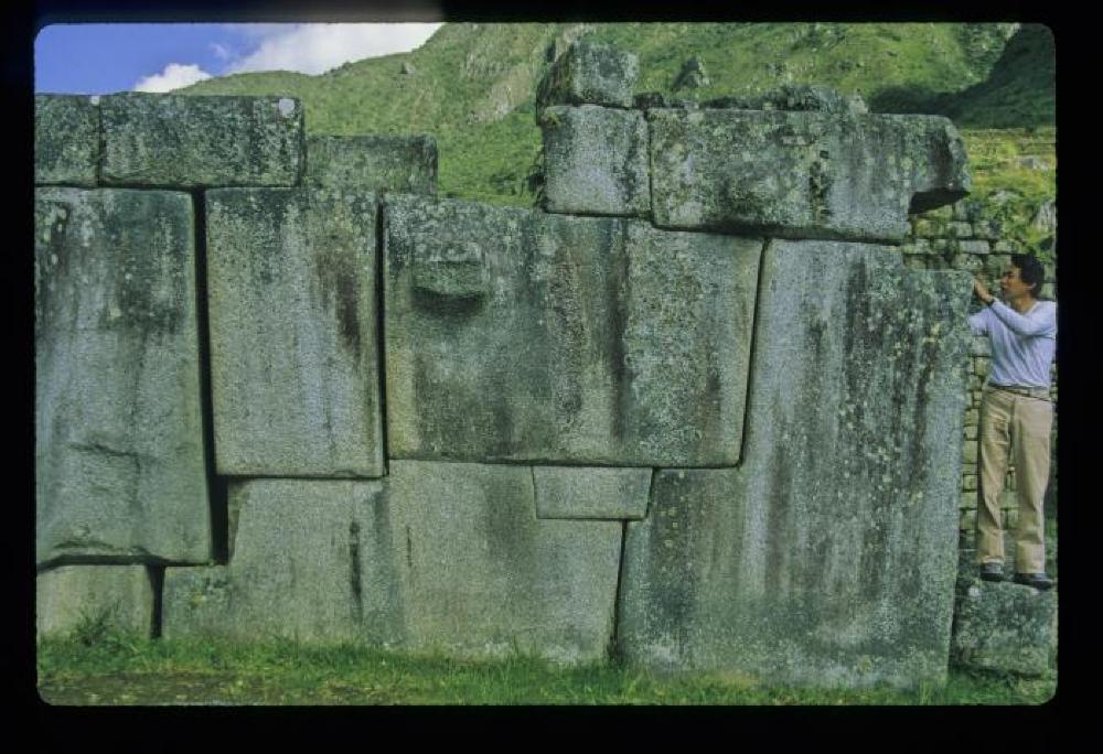 Masatoshi Izumi inspecting Incan stone work, Peru