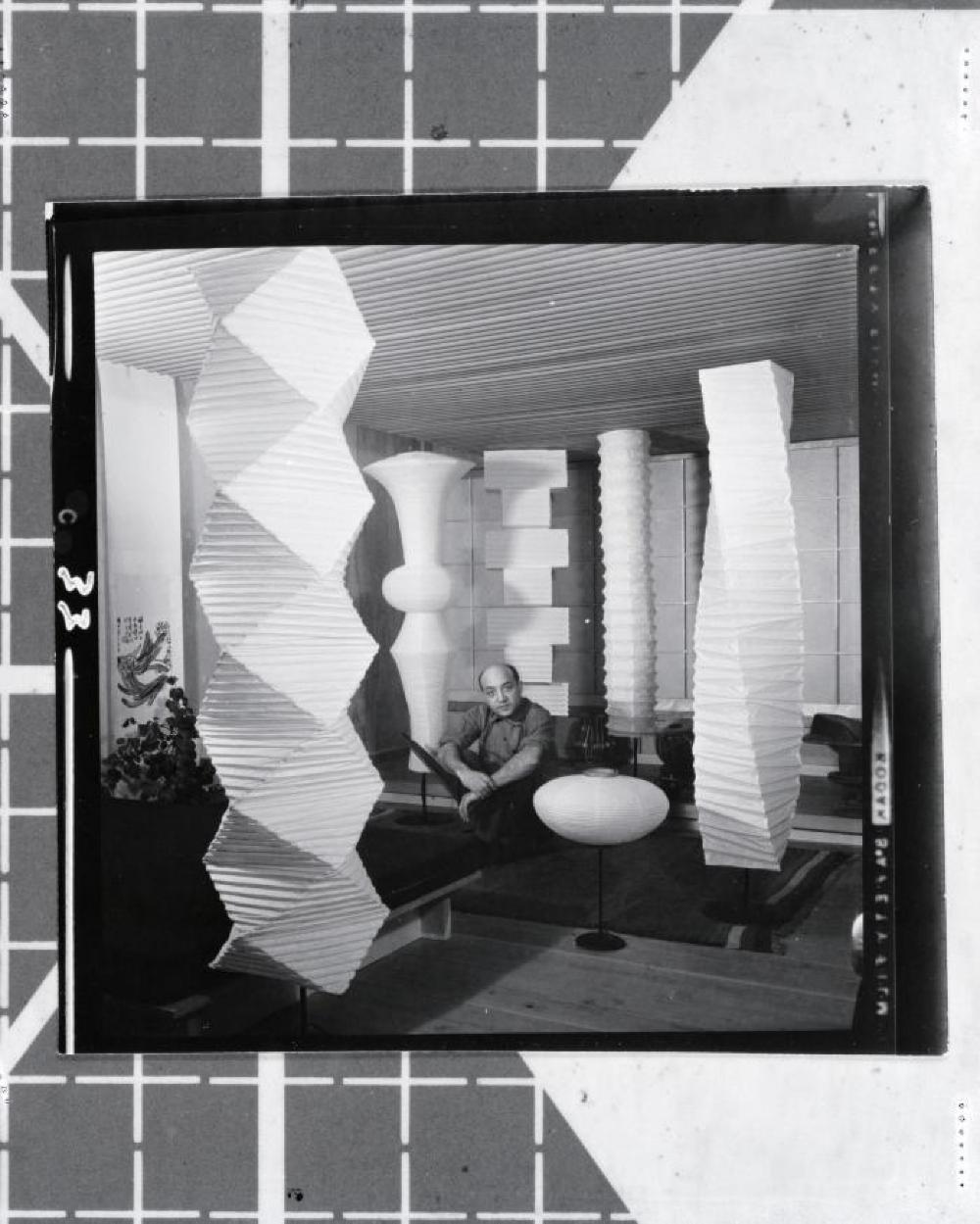 Isamu Noguchi sitting with Akari, 10th Street studio, Long Island City, NY