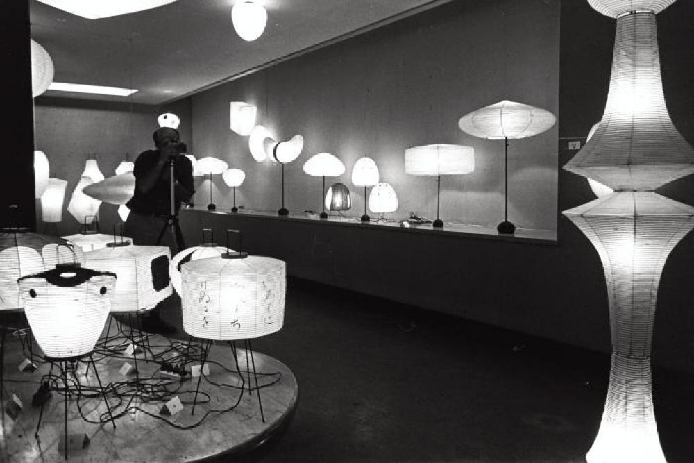 Installation view of "Isamu Noguchi Exhibition," Chuo Koron Gallery; Isamu Noguchi with camera