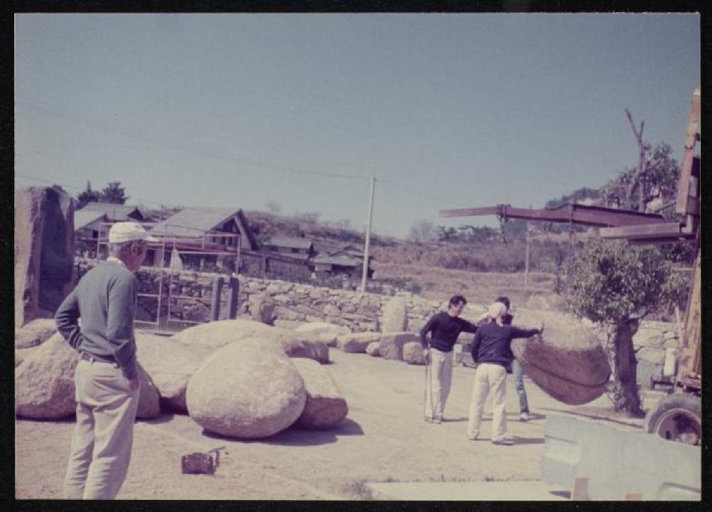 Isamu Noguchi working with Masatoshi Izumi and his crew at Mure, Shikoku, Japan