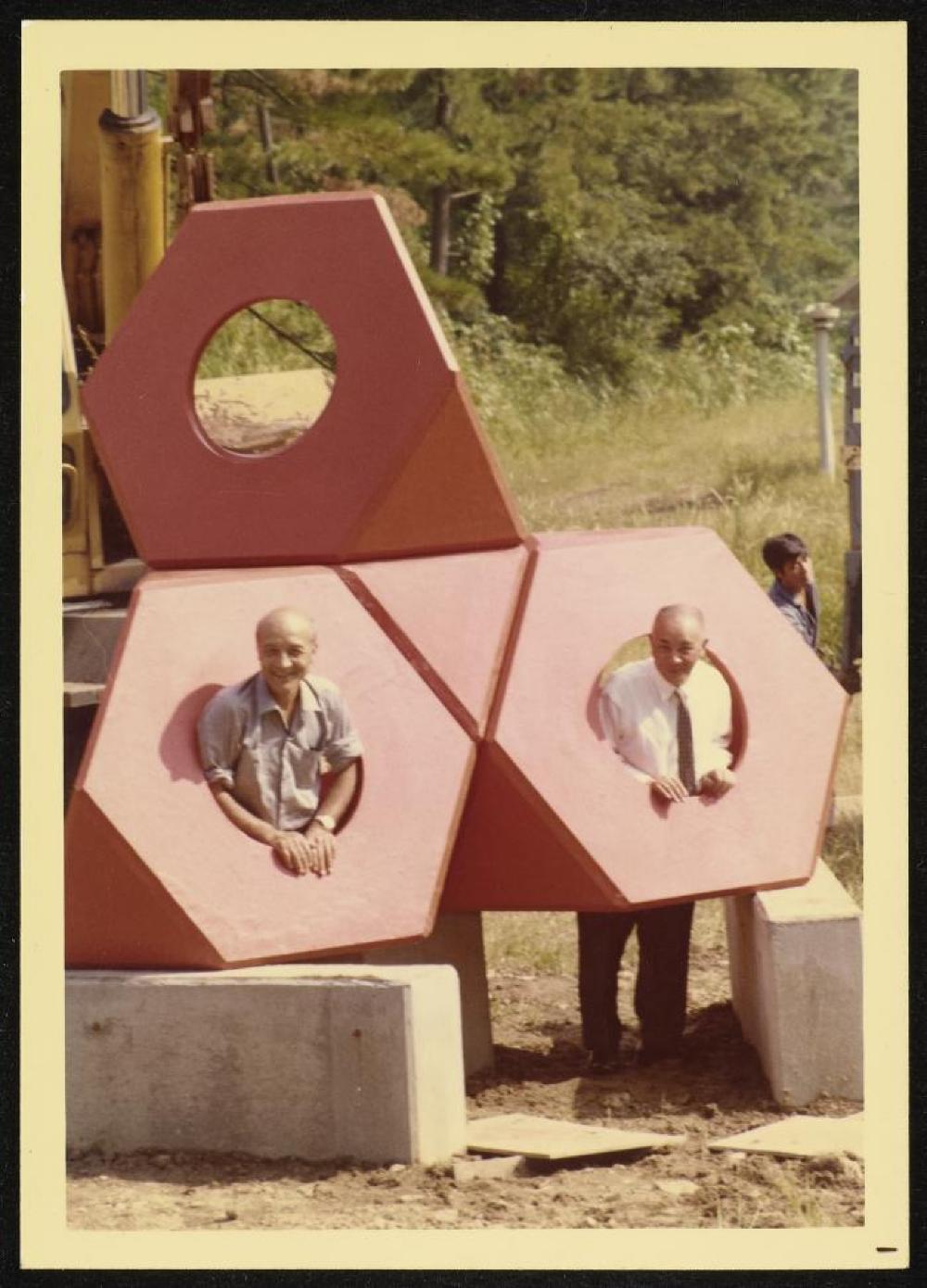 Isamu Noguchi at installation of Octetra at "First International Exhibition of Modern Sculpture," Hakone Open Air Museum, Japan